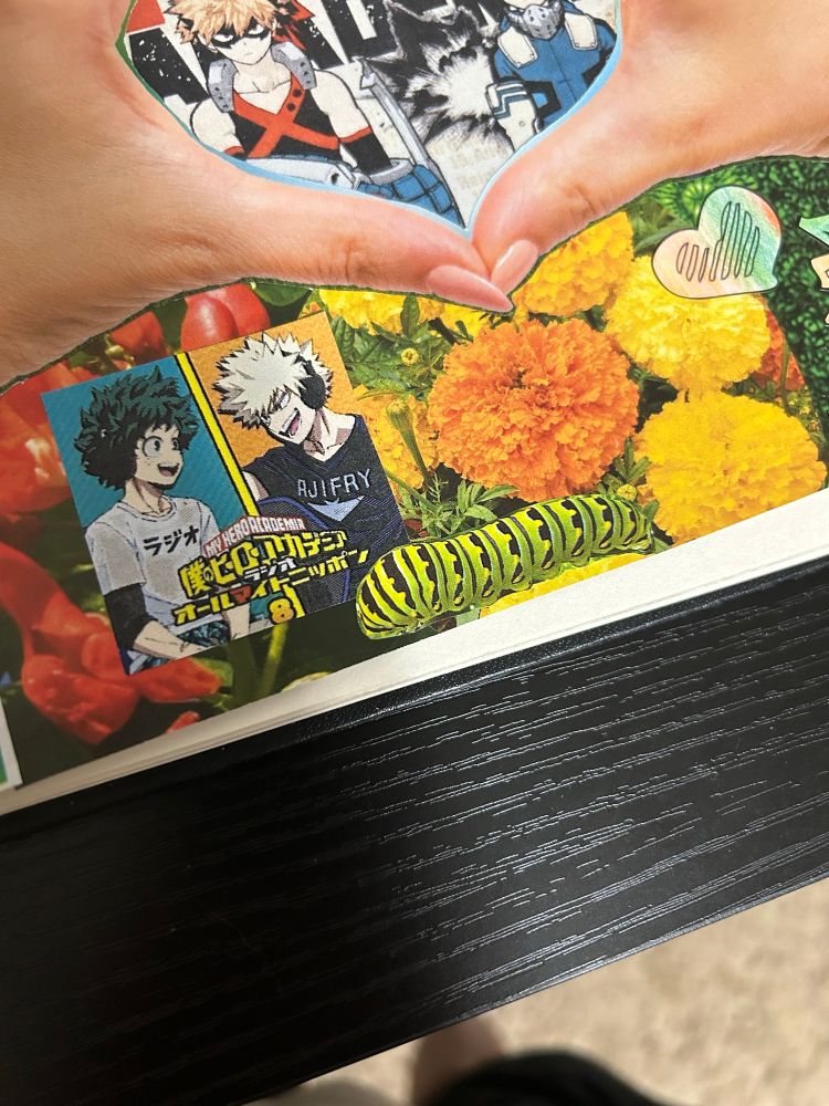 Page of previous bakudeku collage drawing with added green caterpillar cutout