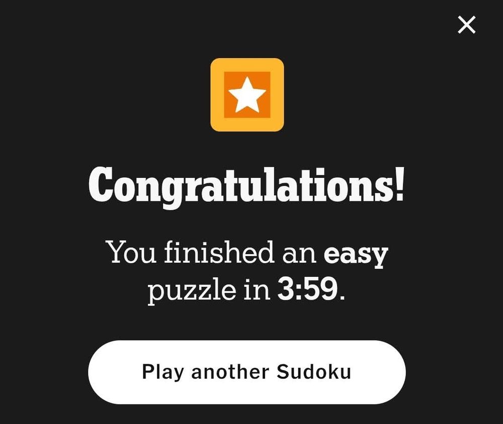 A black screen displays a congratulatory message in large, bold, white text: "Congratulations! You finished an easy puzzle in 3:59." Below, there's a white, rounded button encouraging you to "Play another Sudoku." A yellow square with a white star inside sits at the top left, like a digital gold star sticker. In the very top right corner, there's an "X" close button.