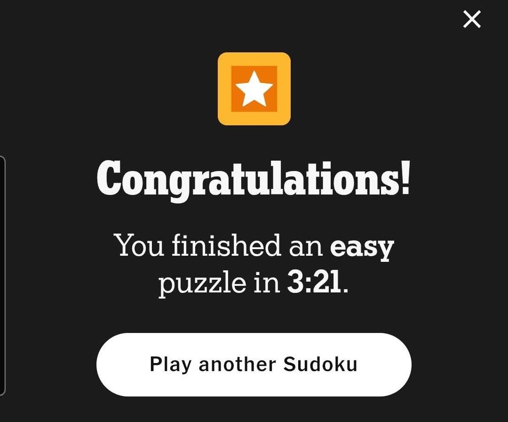A black screen displays a congratulatory message in large, bold, white text: "Congratulations! You finished an easy puzzle in 3:21." Below, there's a white, rounded button encouraging you to "Play another Sudoku." A yellow square with a white star inside sits at the top left, like a digital gold star sticker. In the very top right corner, there's an "X" close button.