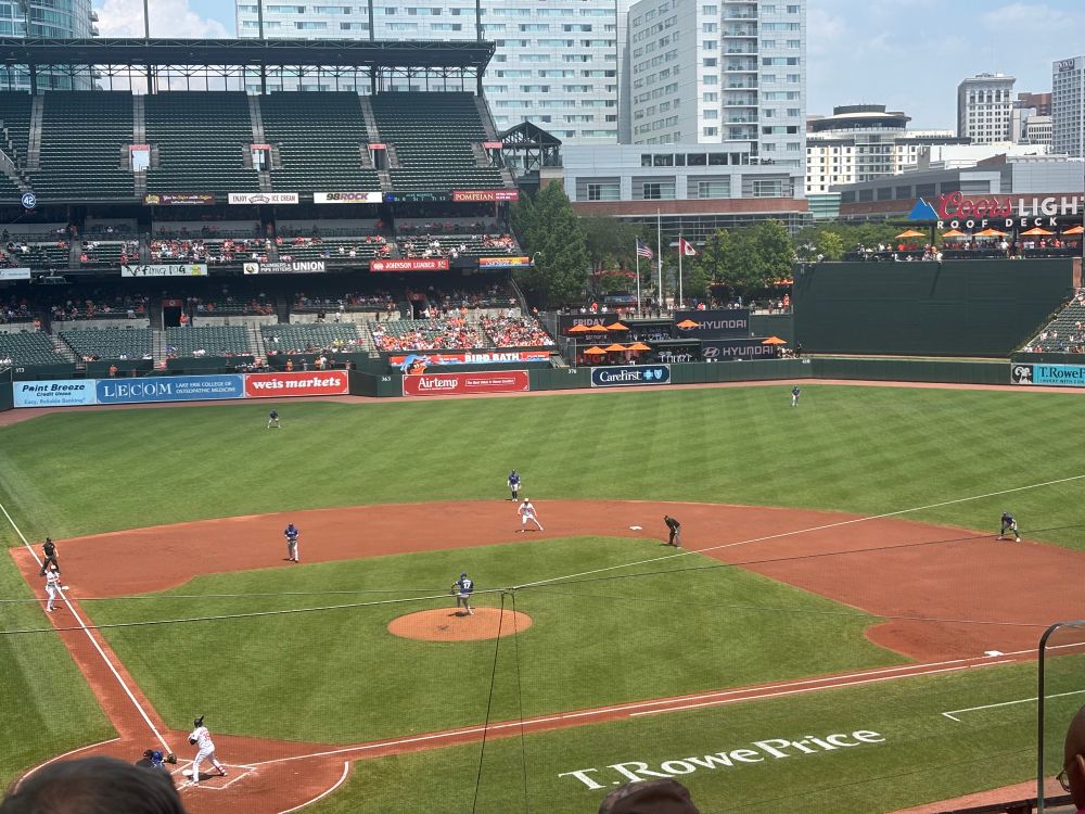 A beautiful day at Camden Yards — a view of the field from the second level, behind home plate.