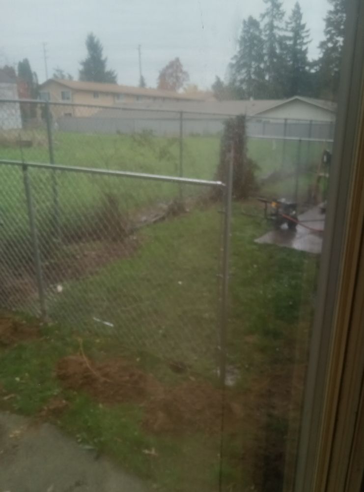 Gates being put up back a small apartment between two apartments. 