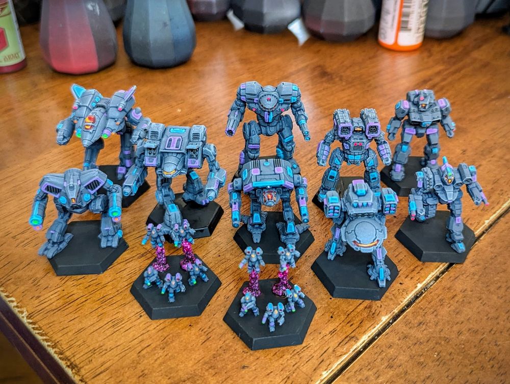 Nine various clan mechs and two groups of Elementals painted in Cloud Cobra Zeta Gallaxy scheme.