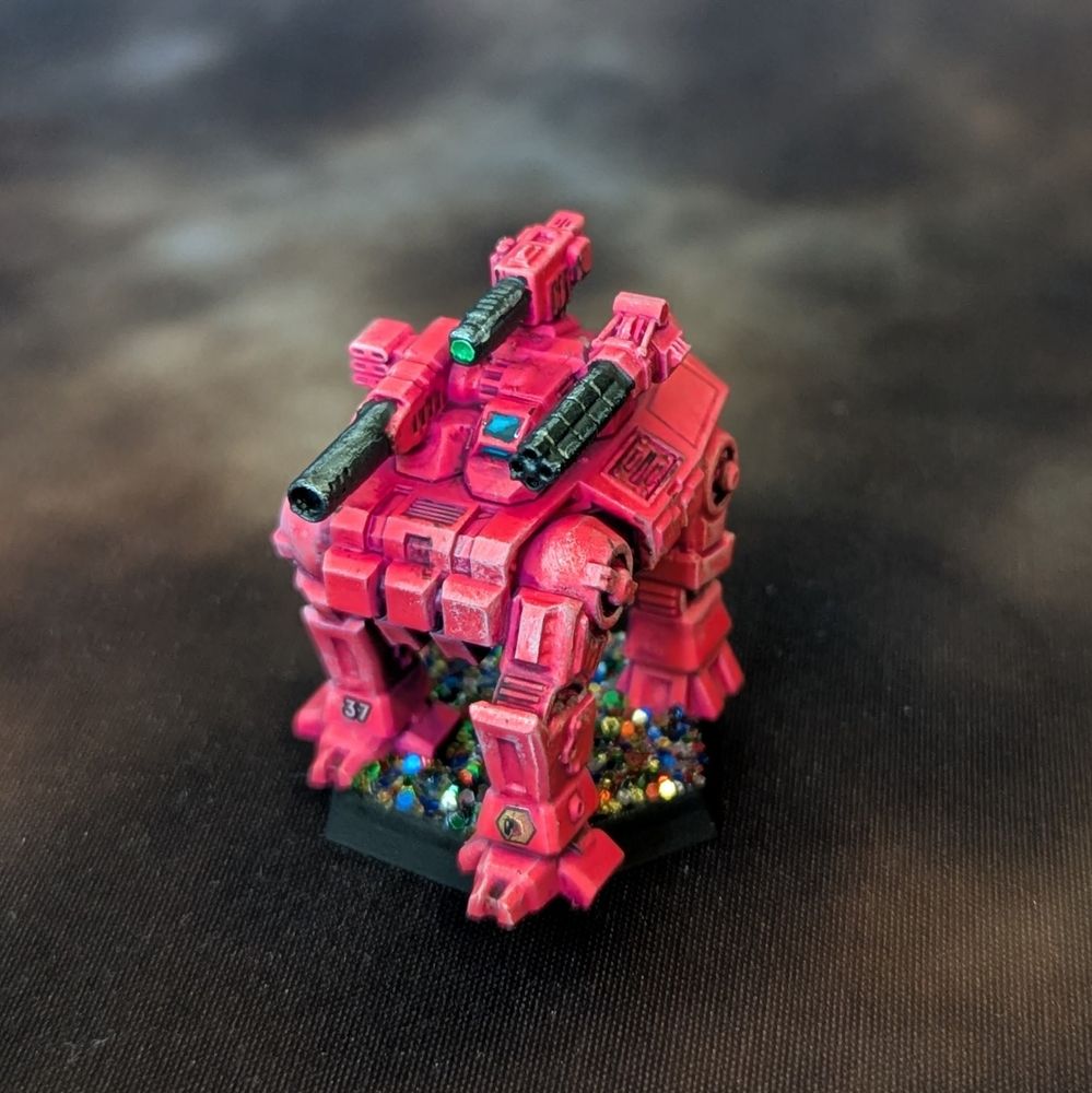 A Thunder Stallion mech for Battletech painted in bright pink paint and the base is glitter.
