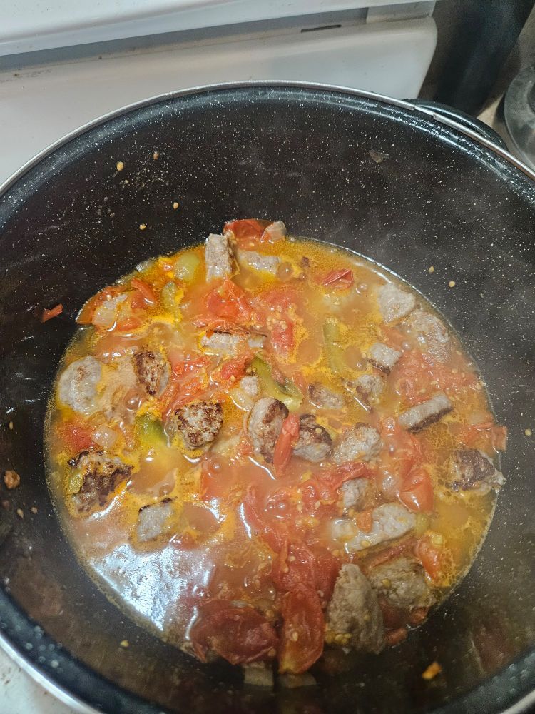 Sausage peppers onions and tomatoes 