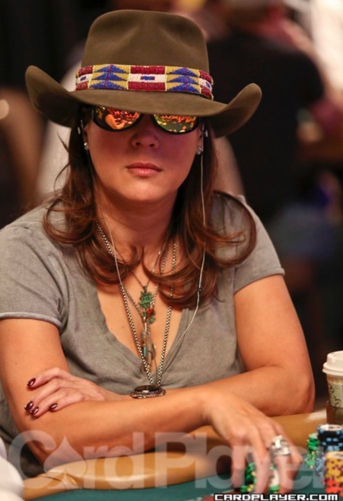 Jennifer Tilly looking cool and hot as fuck at the poker table in mirrored shades and a cowboy hat