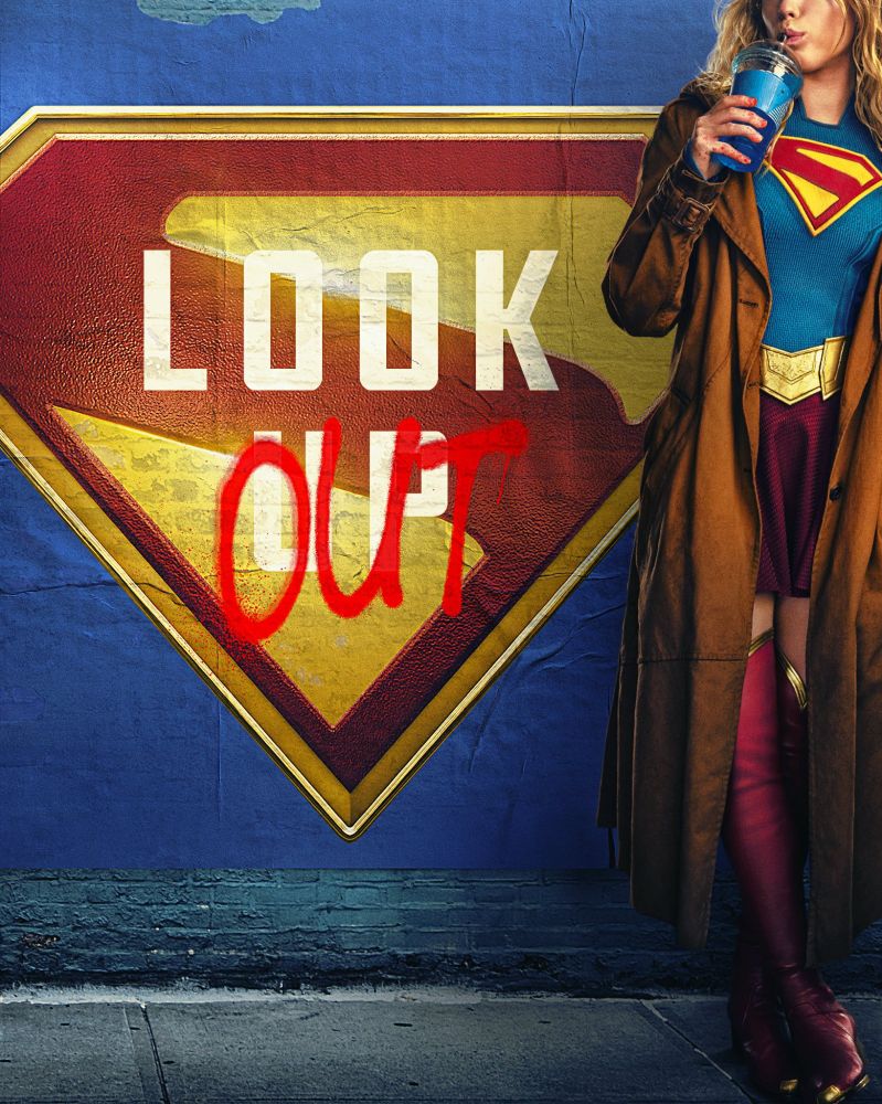 Supergirl poster. Supergirls standing holding a drink next to a Supergirl logo that says "look out."