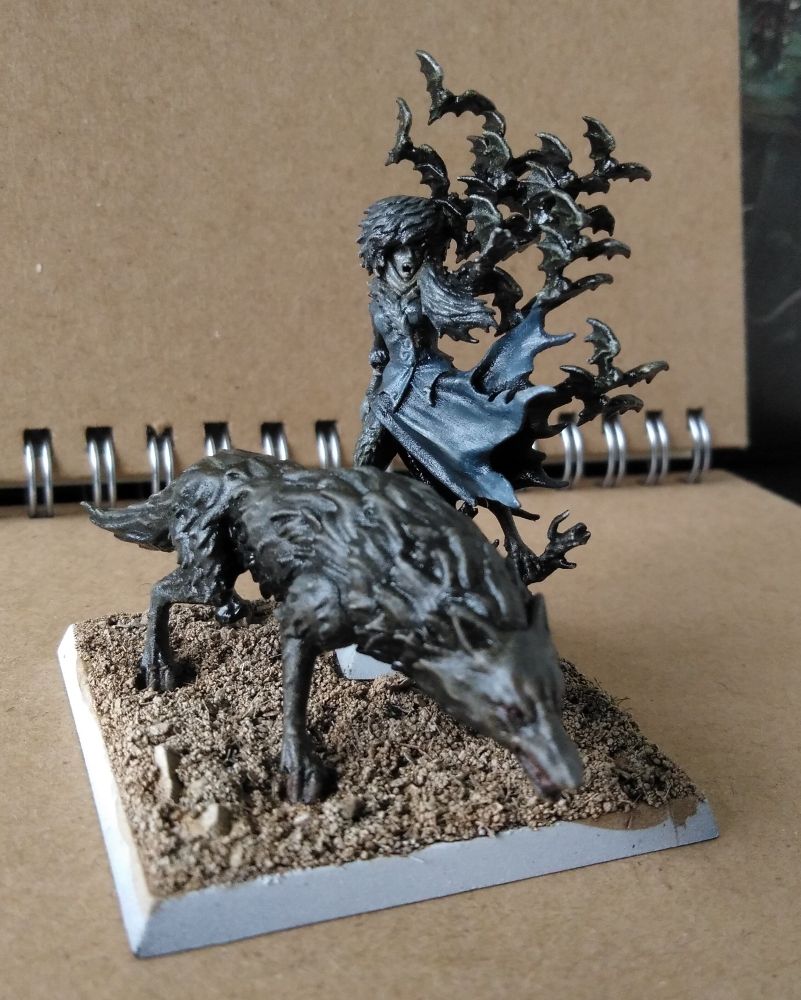 A vampire lady in winter clothing with flick of bats flying away from her and a large wolf standing protectively before here.

Gretchen Von Carstein, eldest daughter of the Old Count, is loving her unlife, touring the Empire and barely paying even lip service to the idea of retaking or restoring the family estates lost when Manfred was defeated. Her favourite pet stays loyally by her side, and even those killed by Empire soldiers have risen again to follow her alongside the host of bats who once made their roost in the castle's dark crevices.