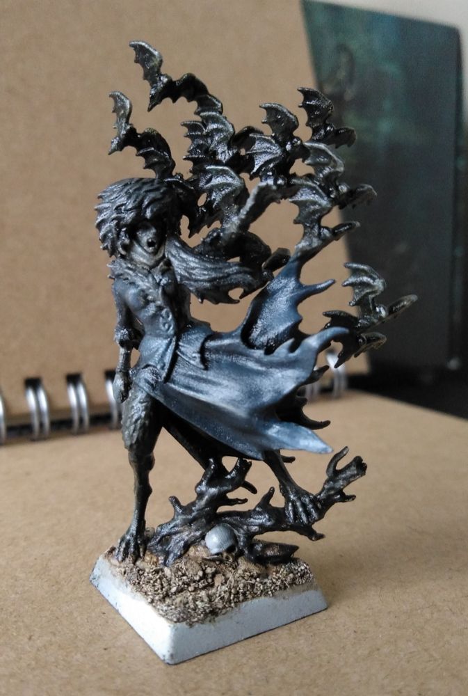 The vampire, posed looking to the right.