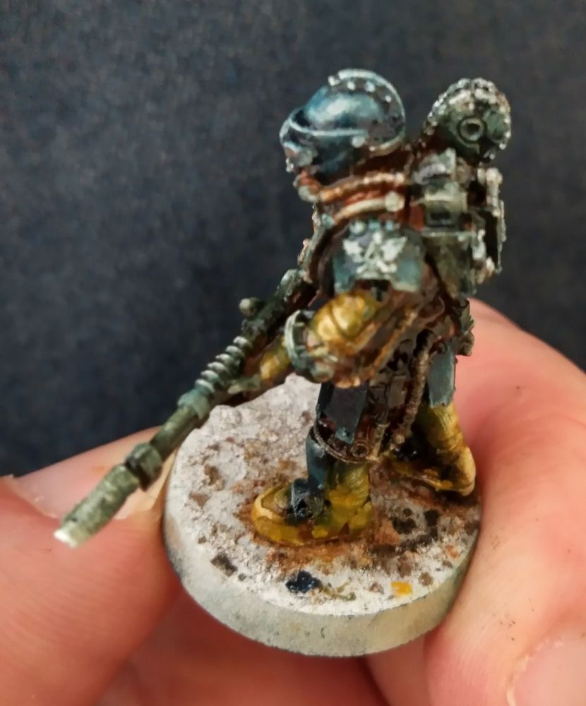 Solar Auxilia model from Forgeworld, from upper left, painted with oils.