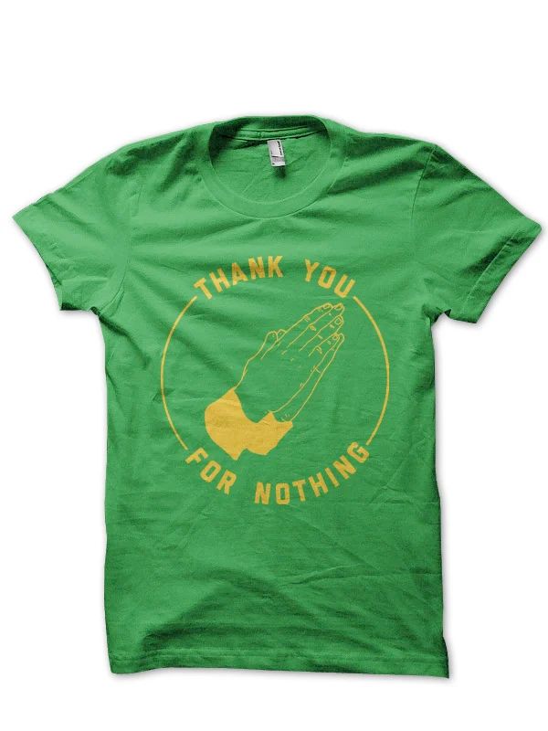 a green tshirt with yellow print. The tshirt illustration has two praying hands, and the text says "thank you for nothing"