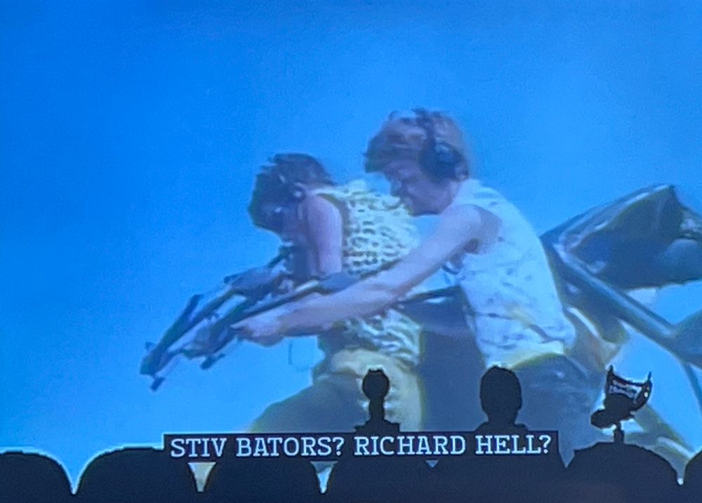 MST3K scene in which Joel and the bots describe two 80’s punk guys as looking like stiv bators and Richard hell 