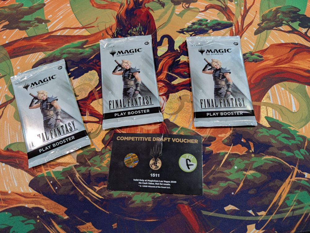 Three Final Fantasy play boosters on a table next to the entry ticket for a competitive draft.