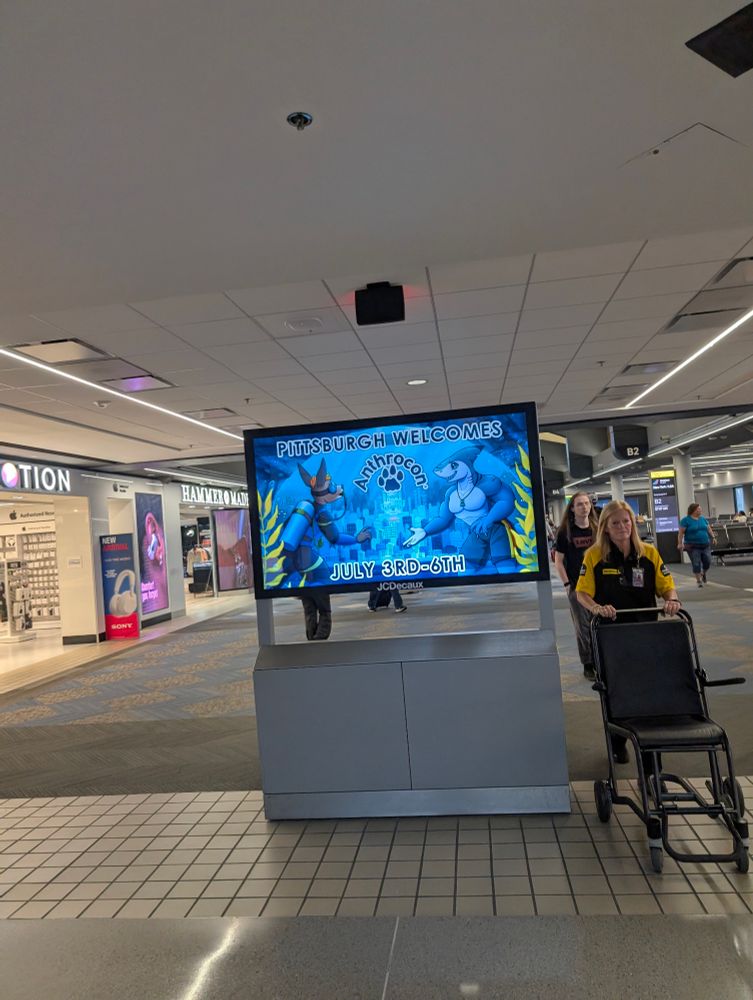 ad display saying "Pittsburgh Welcomes Anthrocon"