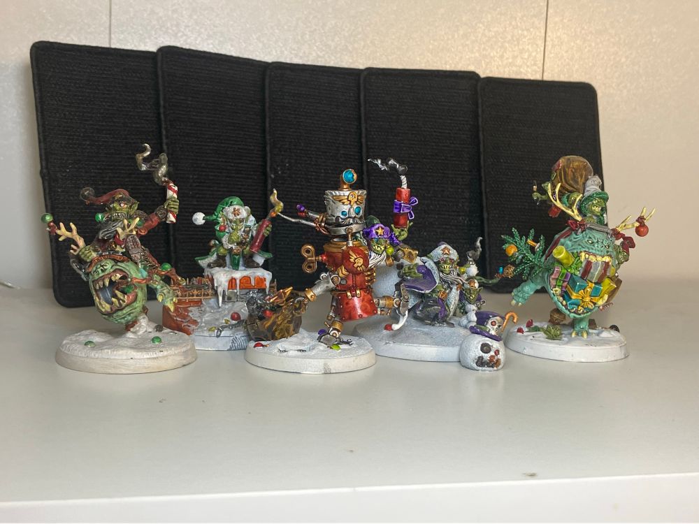 A variety of Santa goblins with explosives and riding monsters.