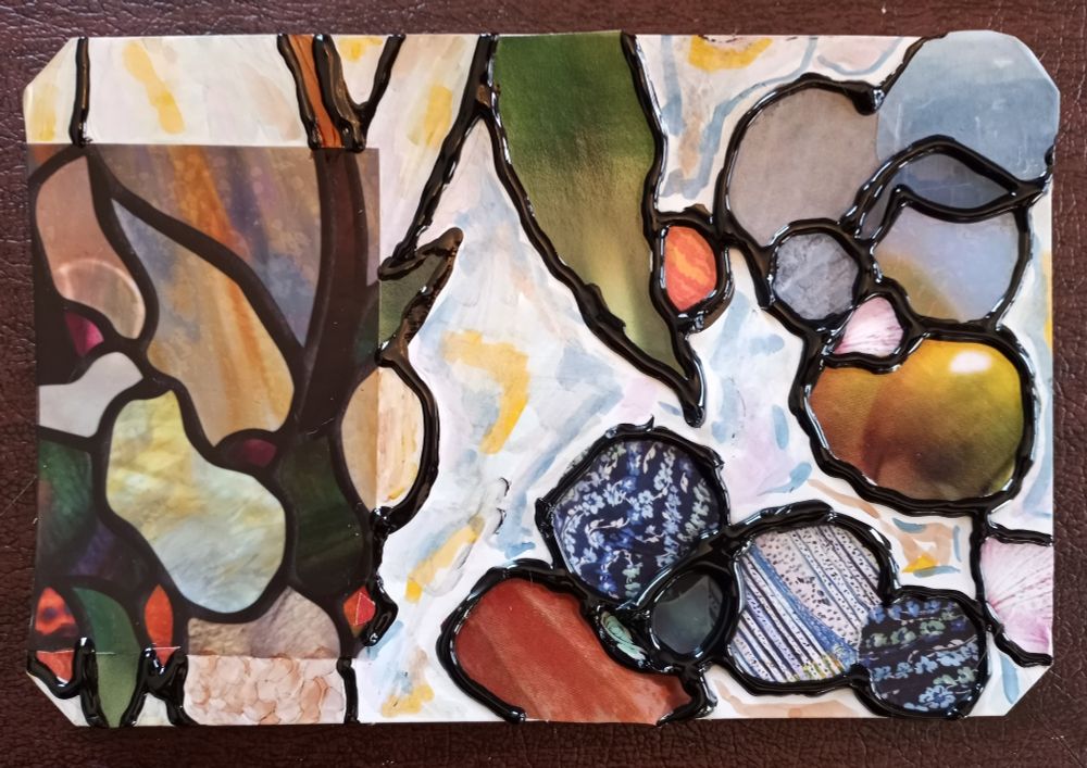 A mixed media collage based on a vinyl window cling suggesting stained glass. 