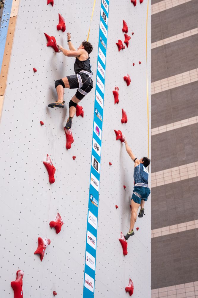 Zach Hammer (left) competing at the IFSC Climbing World Cup