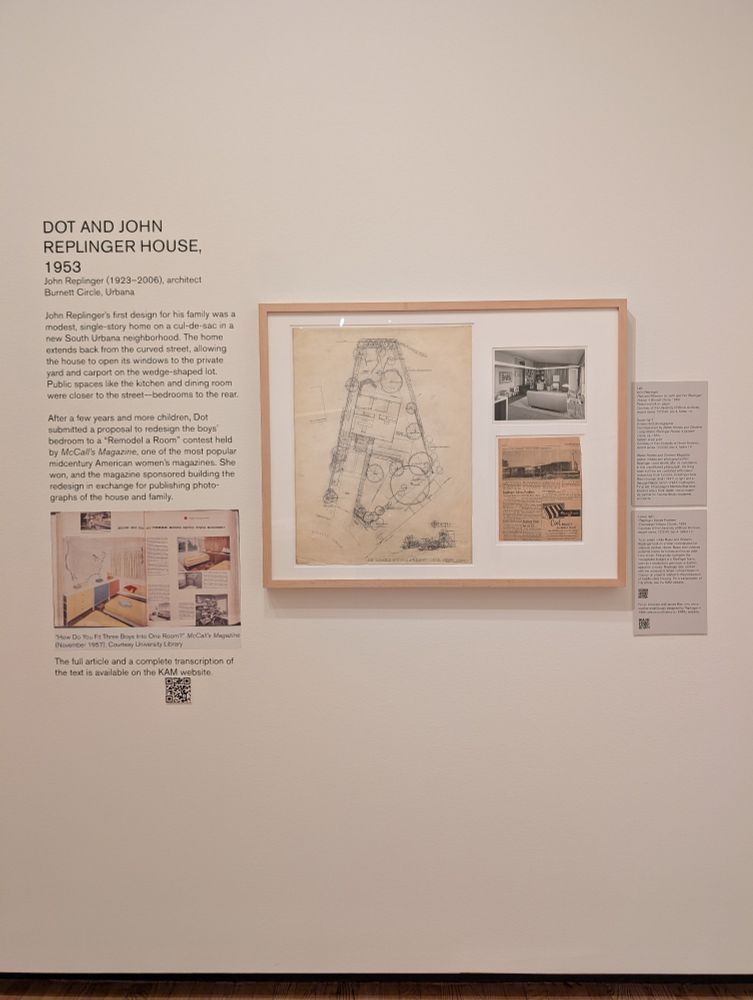 Photograph of the exhibition installation for the 1953 Replinger House, showing an architecture plan and other print media