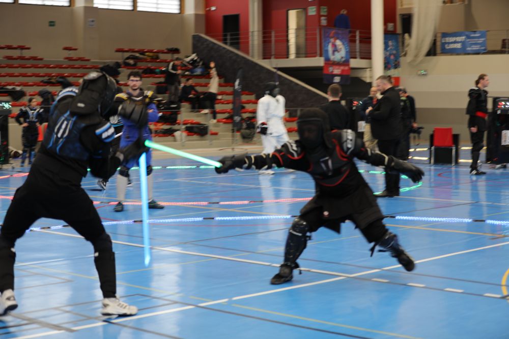 LED saber fencer lunges at the opponent 