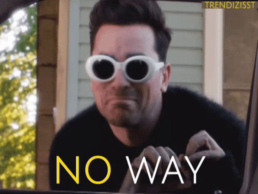 a man wearing sunglasses and a black sweater says " no way "