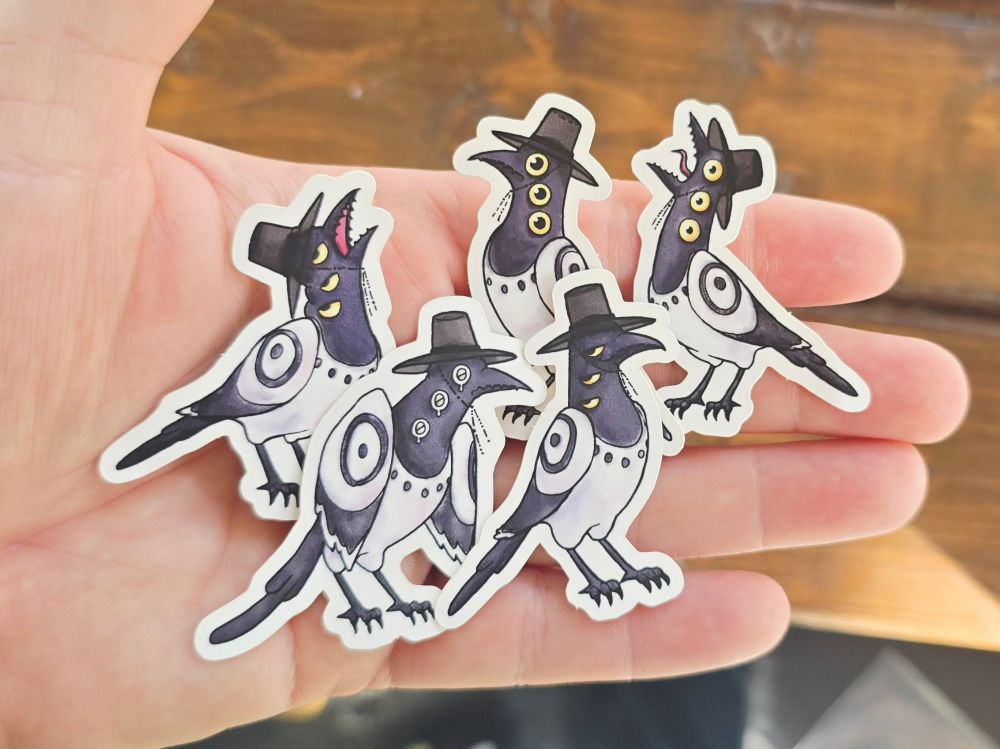 Five mini 2" matte stickers showing a variety of moods and expressions of Magpie.