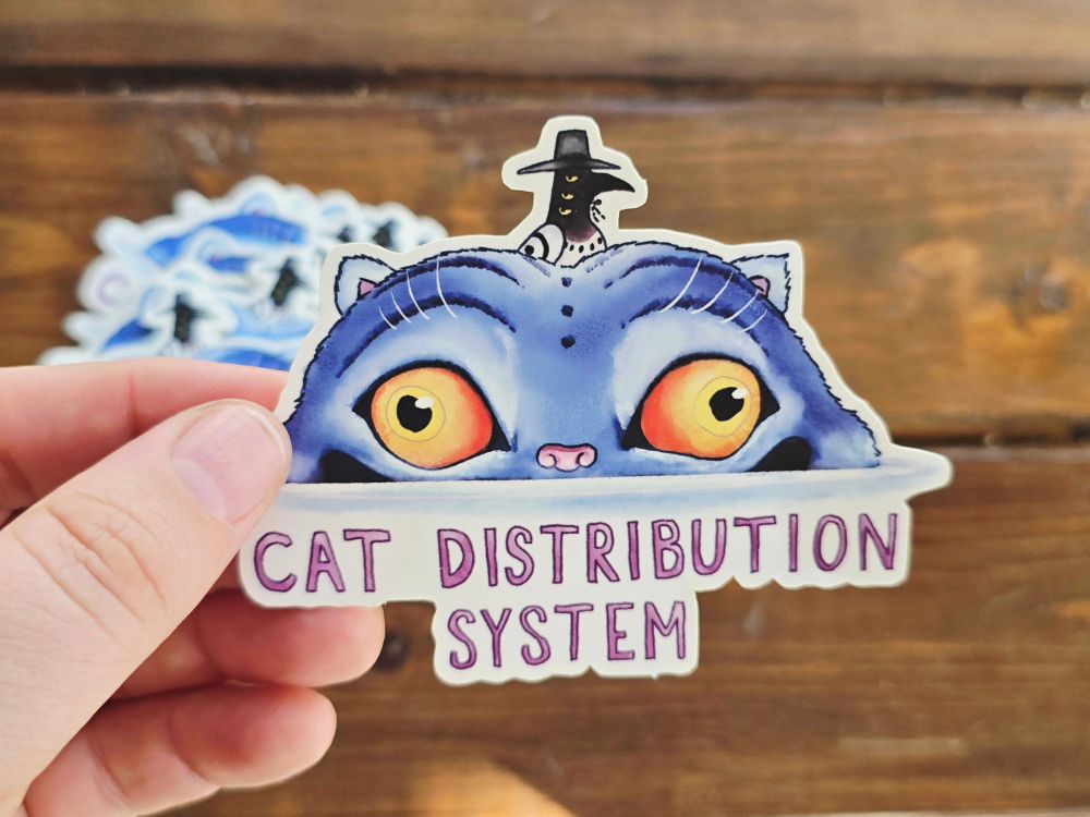 3" matter sticker of Tiger rising from the ground with Magpie on his head, below it says Cat Distribution System 