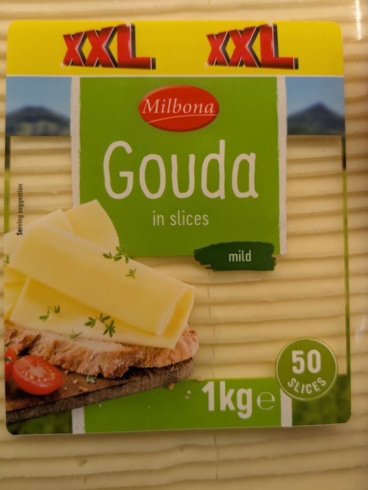 A close-up of the front label of the packet, detailing 1kg of mild Gouda cheese, presented as 50 slices, and a serving suggestion picture.