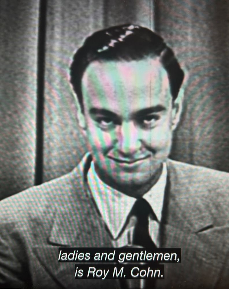 Roy Cohn, looking absolutely evil, in a frozen image from a documentary