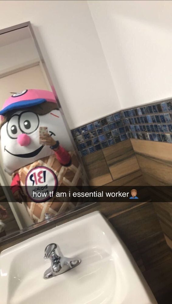 April 2020 tweet of Twitter user @LilTrePod in a Baskin Robbins cartoon ice cream cone (with face and hat) suit. The caption reads "how the fuck am i an essential worker?"