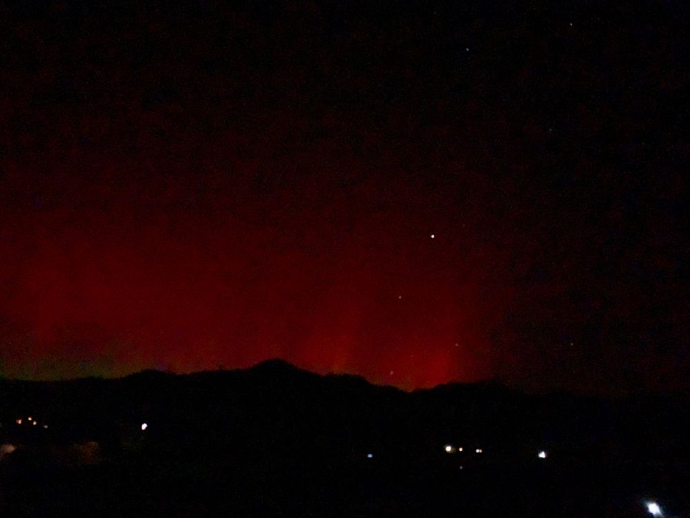 Red pillars Aurora Borealis