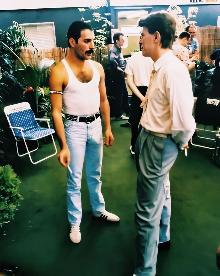 Freddie Mercury and David Bowie chatting backstage at Live Aid. 