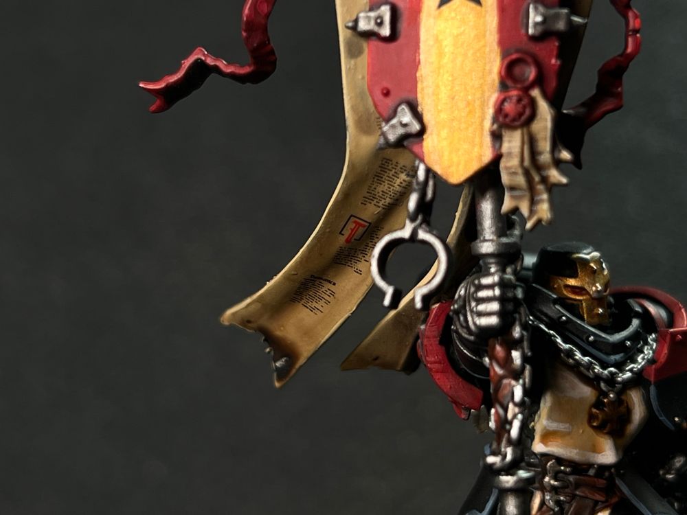 Close-up of the text on the Crusade Ancient’s banner. 