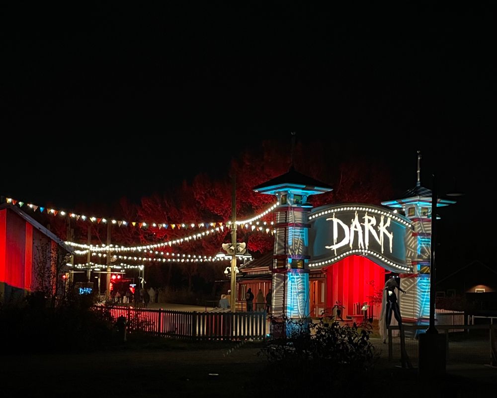 Fort Edmonton park carnival area decked out for dark event. 