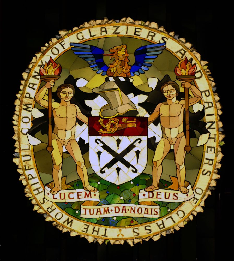 Lawrence Lee's heraldic glass for the Worshipful Company of Glaziers. This, like the windows at the Royal Society of Chemists (last week's post), had glass stuck down rather than leaded. This is a backlit panel rather than a window. The dark backdrop is also glass.