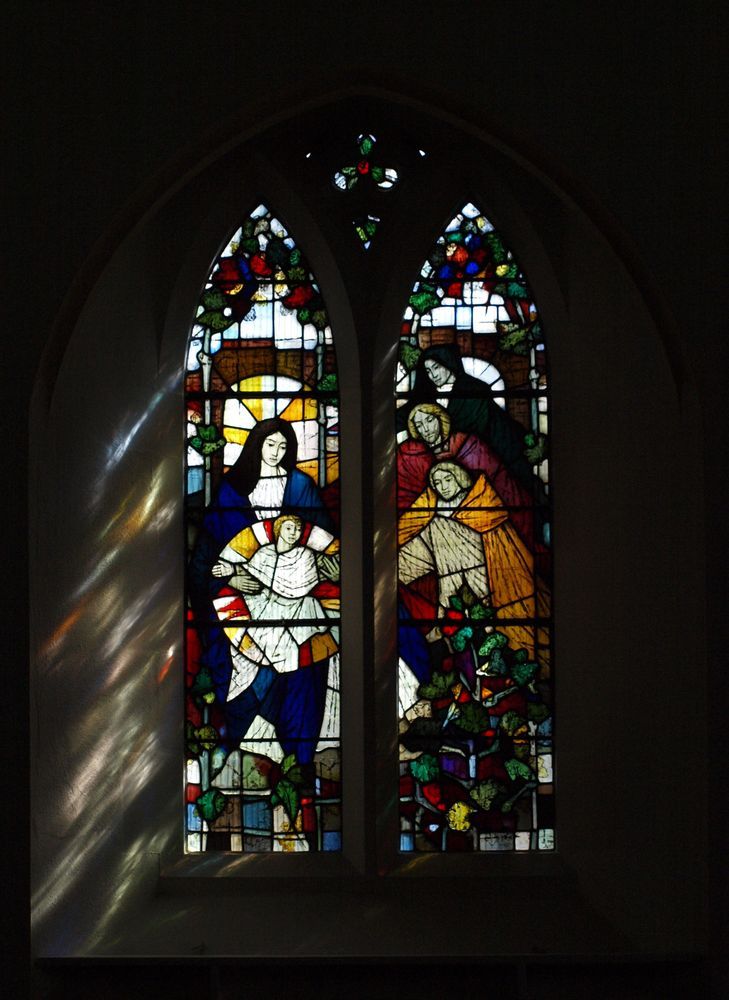 Two-light colourful stained glass window