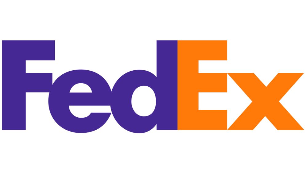 FedEx logo. There’s an arrow between the E and x. 