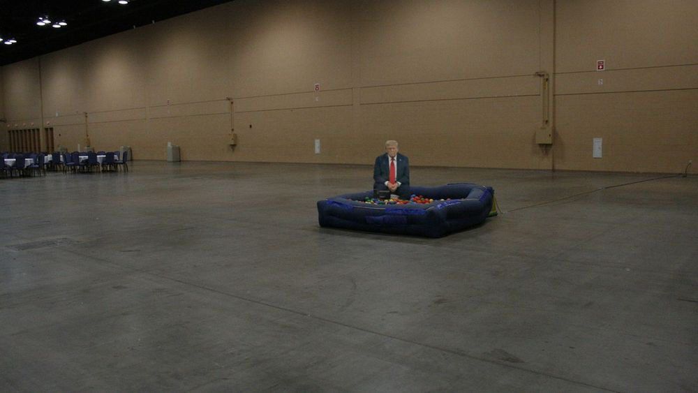 The empty Dashcon ball-pit in the middle of an empty room with Donald Trump, alone, looking sad photoshopped into it