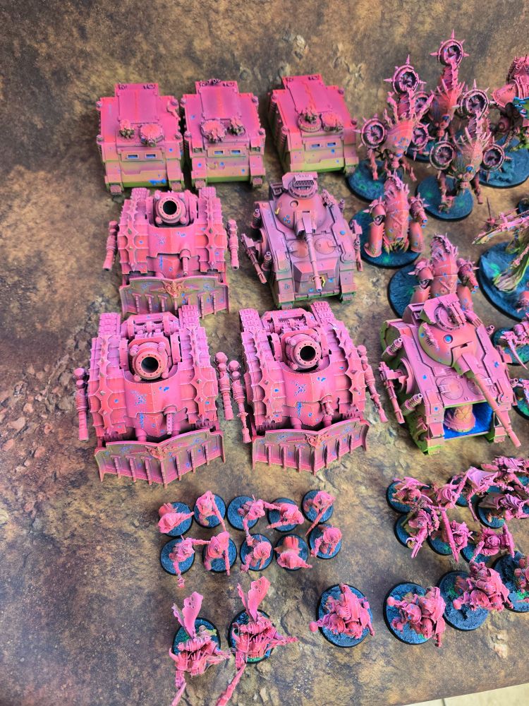 Three rhinos, two predators, three plague burst crawlers, ten cultists, two malignant plaguecasters, three foul blightspawn, two myphitic blight-haulers, and three feotid bloat drones.
