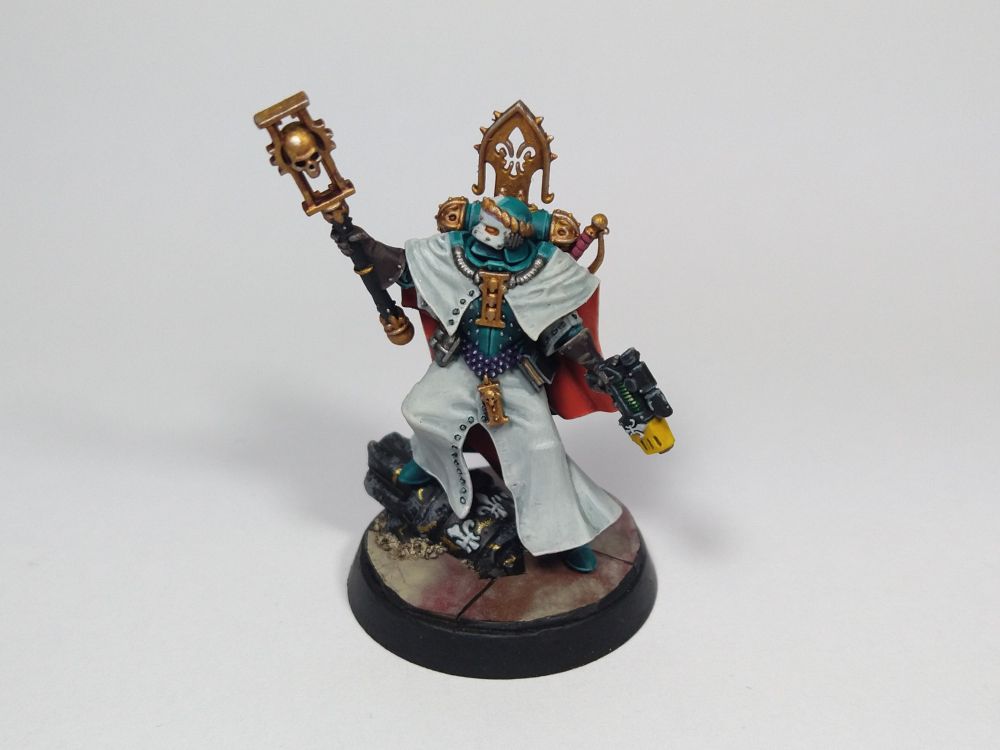 Canoness. The Order's turquoise armor is matched with white vestments, which are red on the inside. Blood-marble makes the base.
