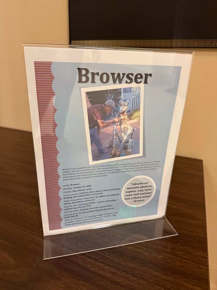 A picture of a placard showing information on California State Library’s mascot, Browser. This includes his birthdate and favorite hobbies, class, and book.
