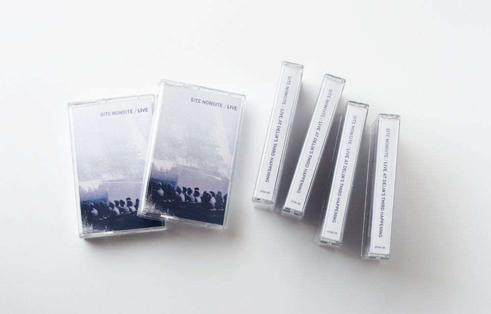 Site Nonsite's Live at Delia's Third Happening on cassette. Photo shows several cassettes on a white background.