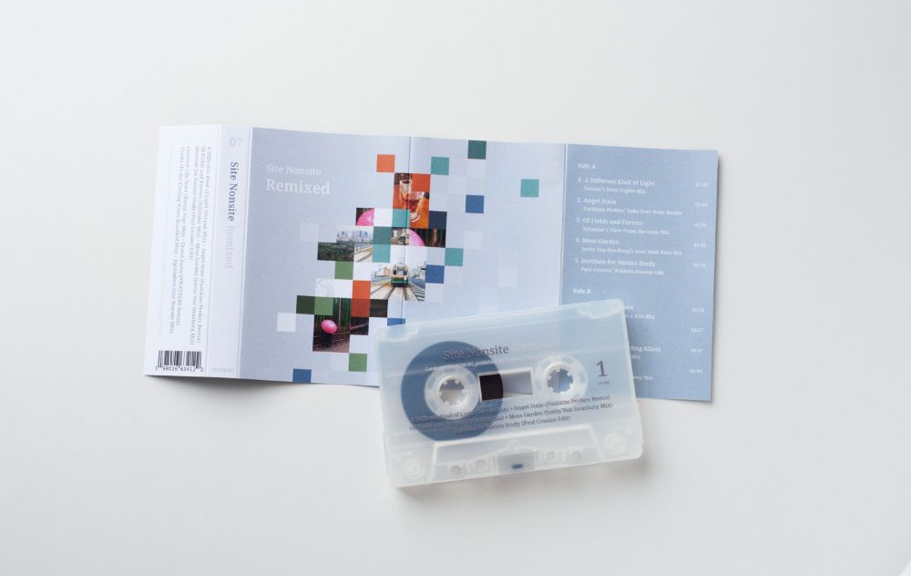 Site Nonsite's Remixed on cassette. Photo shows the inlay card and clear shell cassette on a white background.