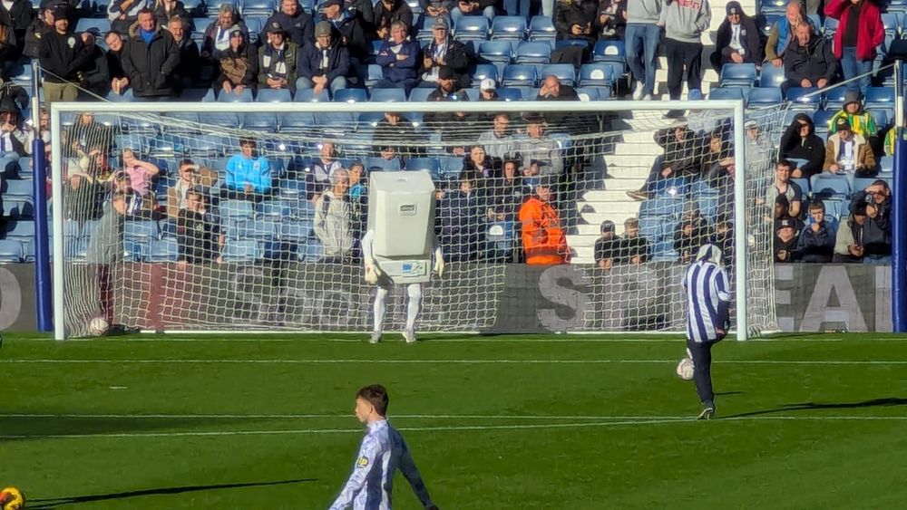 The boiler mascot in goal for the half time challenge 
