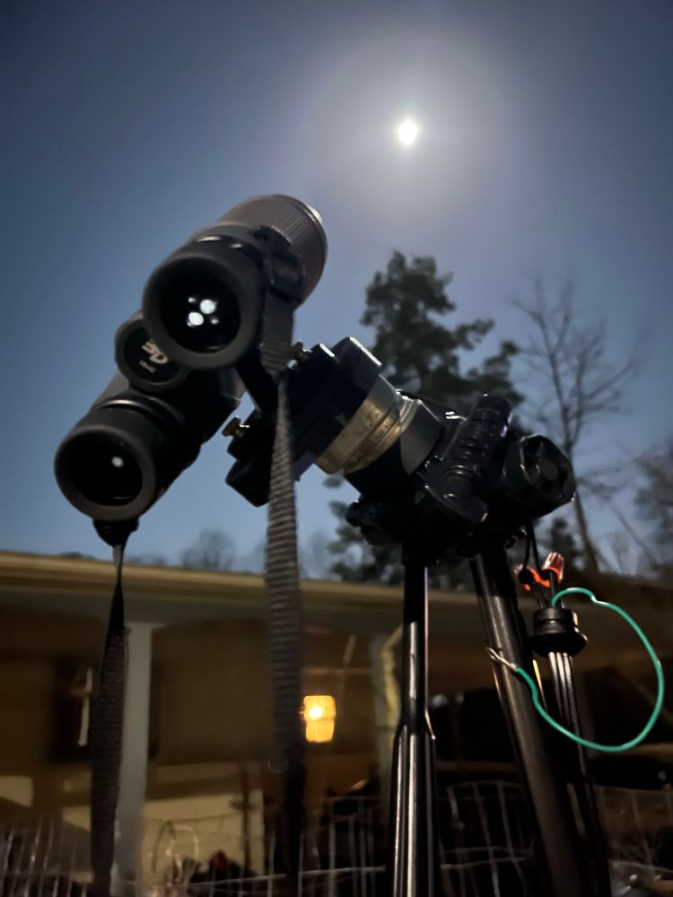 Binocular setup for lunar eclipse. Tripod, 3d-printed siderostat with powered 24-hour clock mechanism to roughly track the moon’s location during the event. 