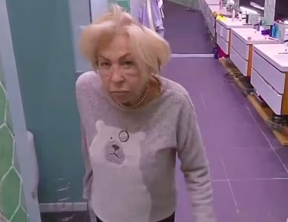 Laura Bozzo looking disheveled. 