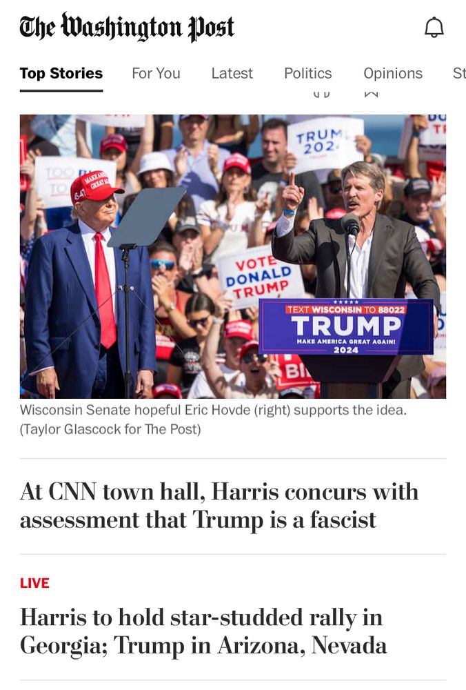 Image of Trump at taller sigh Eric Hovde. (Headline above refers to Trump education policy.) Headline below image: “At CNN town hall, Harris concurs with assessment that Trump is a fascist.” Next headline: “Harris to hold star-studded rally in Georgia; Trump in Arizona, Nevada”