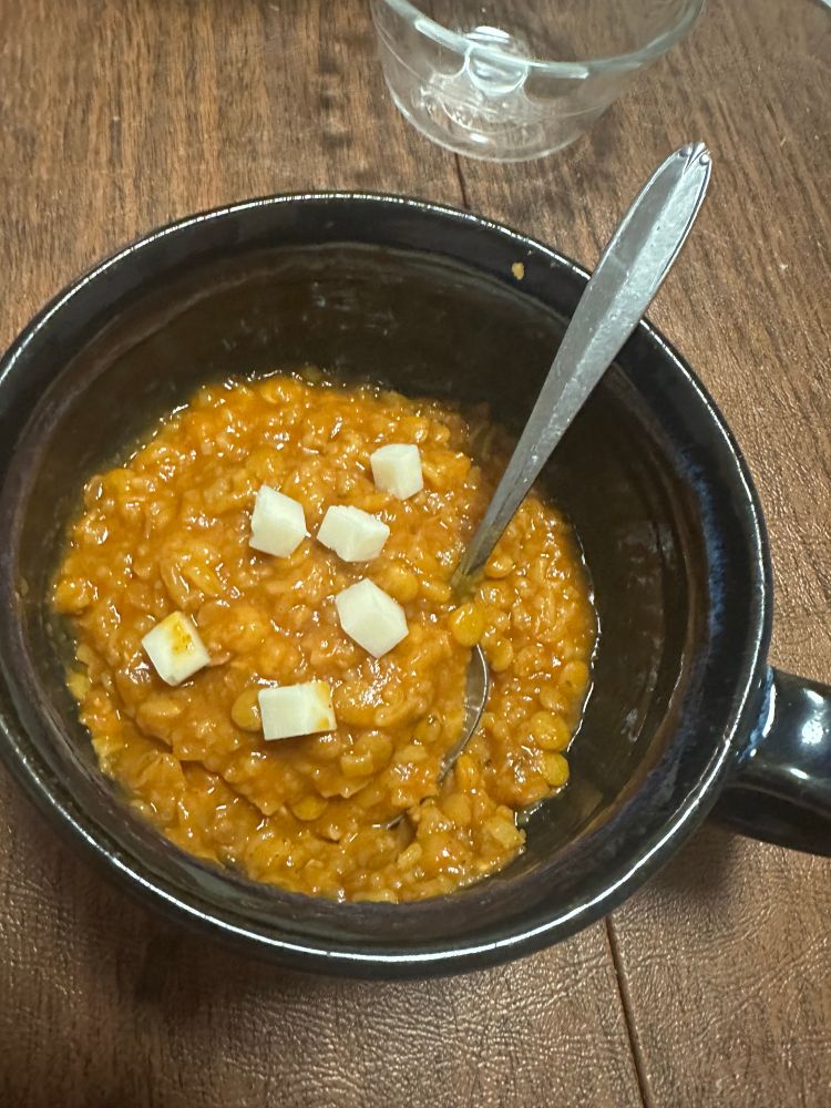 Soup in a homemade bowl with goat-fetz (softer than feta but similar flavor). 
