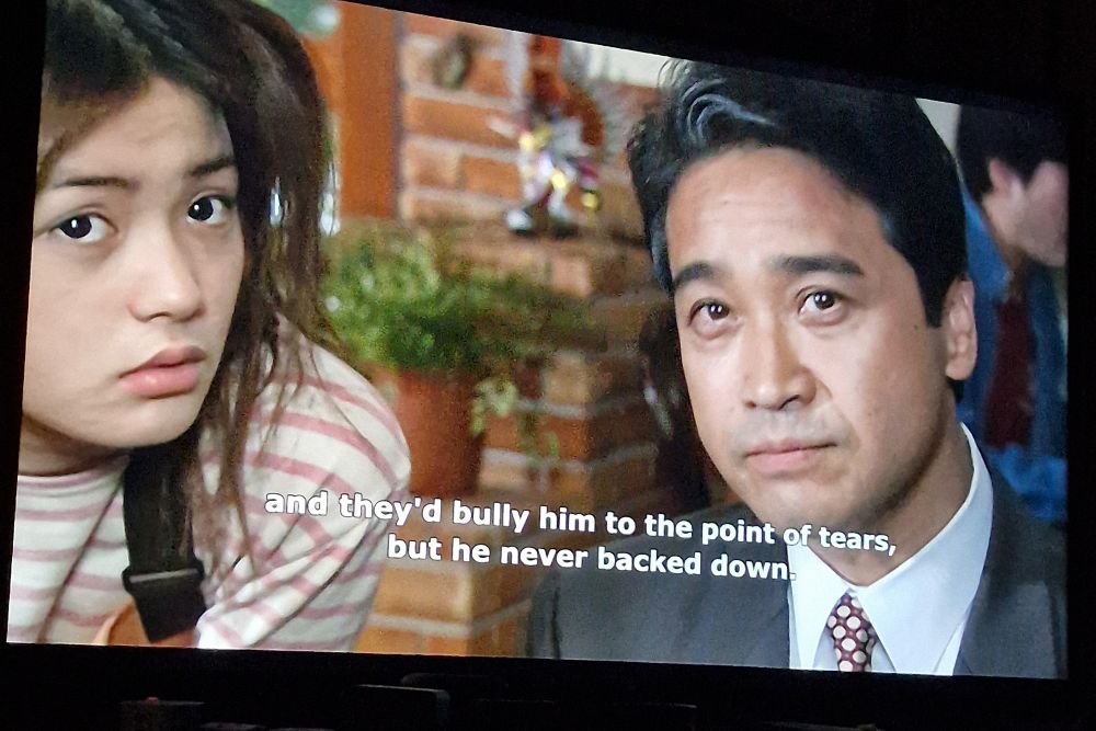 Godai's childhood teacher tells a heartwarming story about how he used to stand up to childhood bullies.