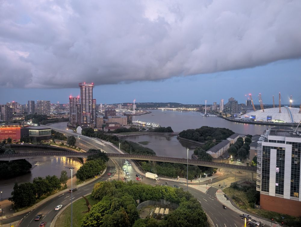 17th floor view of London, with the O2, the Thames, cable cars, DLR and maybe even a glimpse of London City Airport in the distance.