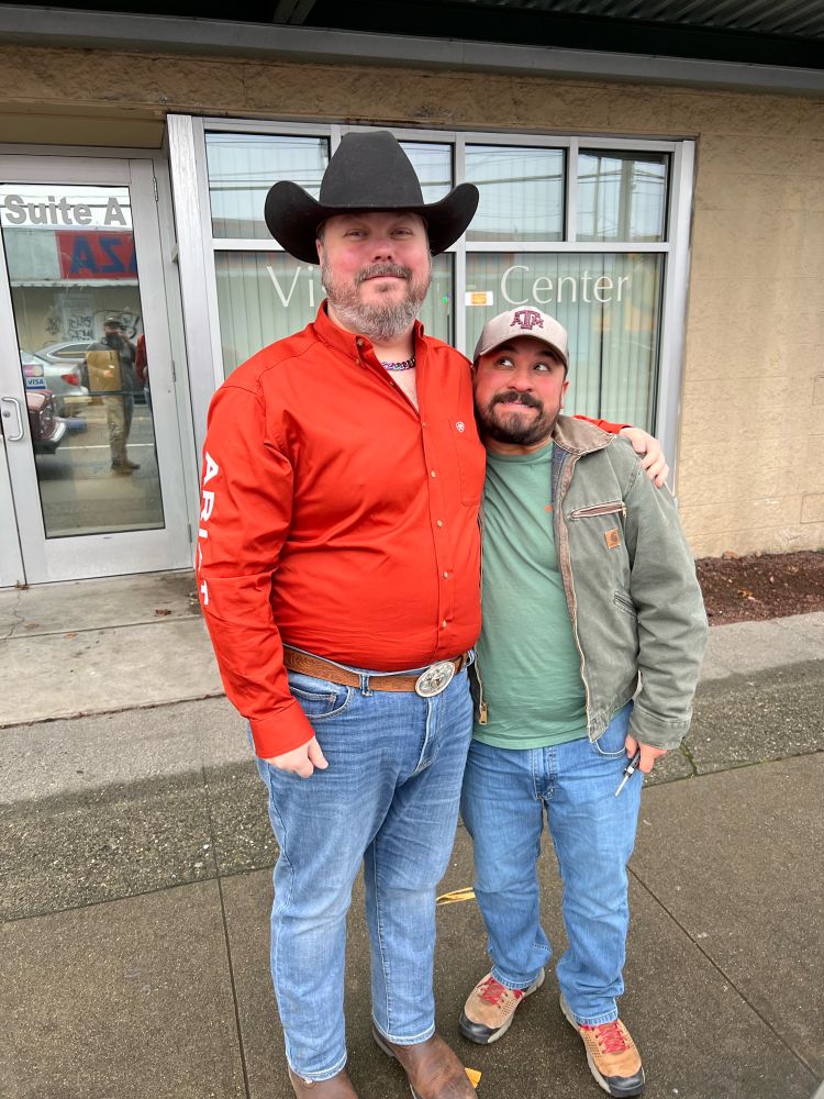 Two bearded men in boots