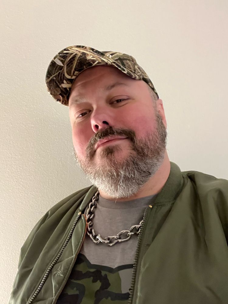 Bearded man in hat